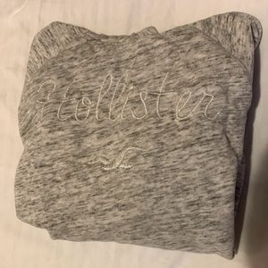 Hollister hoodie- gray preowned-excellent condition. Girls size Lg front sparkle